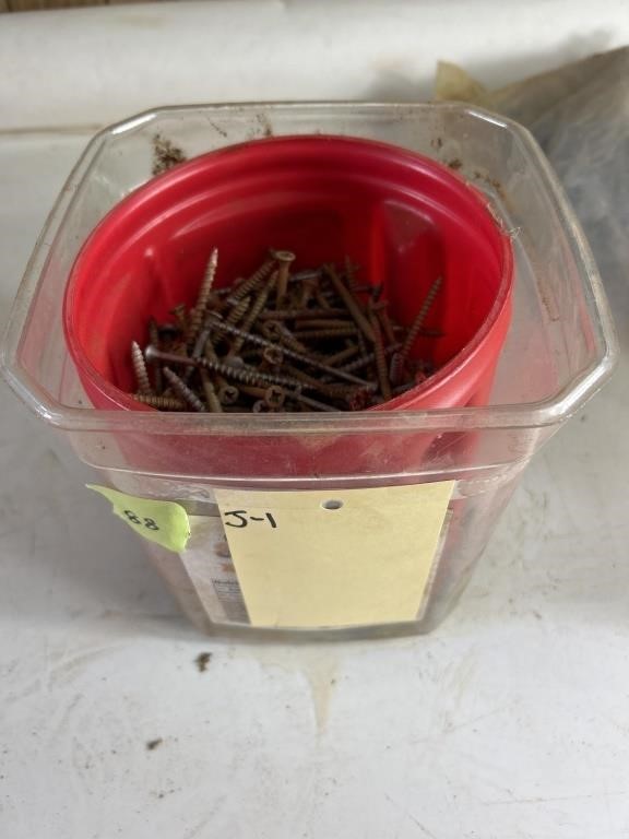 Bucket of screws and nails various sizes
