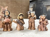 Very small native family figurines