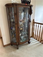 Oak curved glass display cabinet and contents