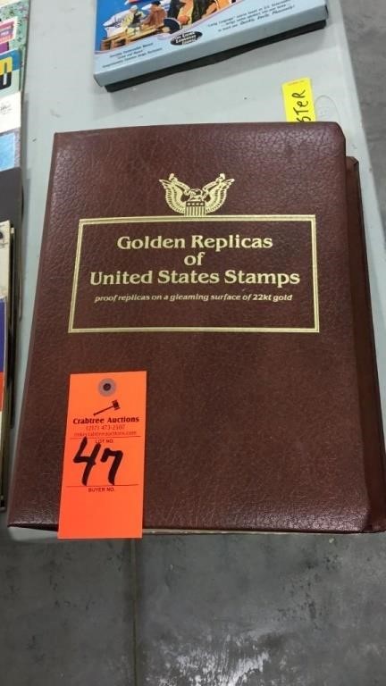 Gold replicas of U.S. stamps book full