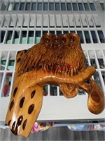 Carved wood owls  (backhouse)