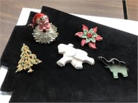 Pins; Christmas and elephants