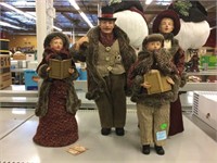 4 Decorative caroling figures. Tallest is 18in.