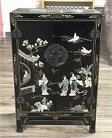 A Jade Embellished Lacquer Cabinet
