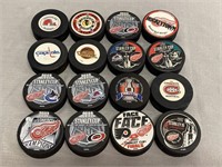 16 NHL Souvenir Hockey Pucks