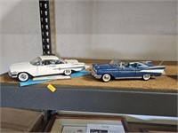 2 die cast chevy cars