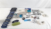 Assortment of car ornaments and brand logos