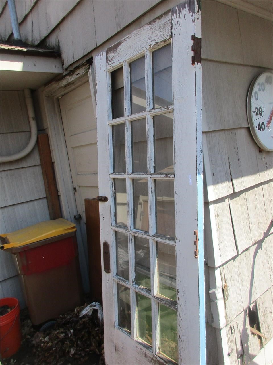 Old door, one broken glass panel