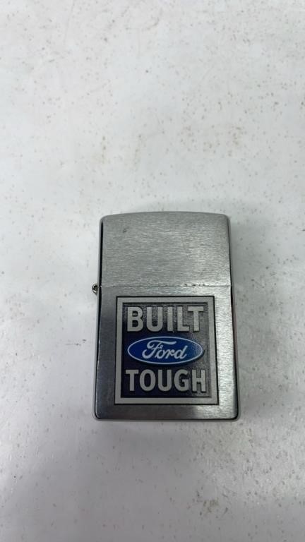 Zippo lighter with Ford engraving on it