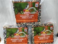 3 woodpecker seed cakes