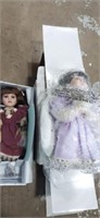 2 porcelain dolls in box