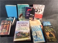 Assortment of hard and soft covered novels