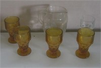 Amber Glasses and Clear Pitcher