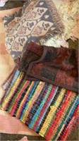 Rugs, braided rugs, fringed rugs, pillows, basket