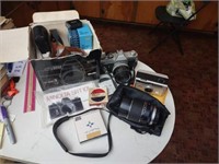 Minolta camera in original box, Canon FTb Camera