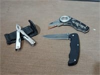 A pocket knife, multi tool and a razor knife