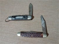 A Kamp King knife and a Kutmaster knife with a