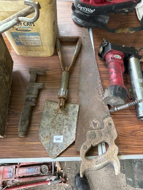 Army shovel, vintage pipe wrench and saw
