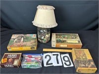 Flat of puzzles, Pencils, Button collection w Lamp