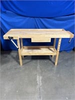 Wooden work bench with 2 clamps and drawer.