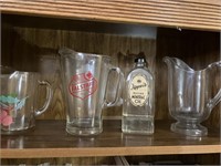 Glass vintage pitchers