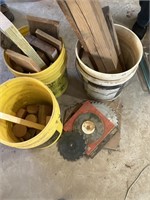 Buckets of scrap wood & saw blades