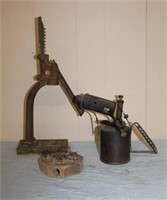 Vintage mouse trap, blow torch and a