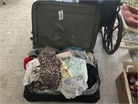 Suitcase full of clothing