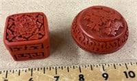 2 carved cinnabar-like Asian trinket boxes