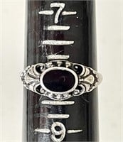 Sterling silver ring with oval onyx stone