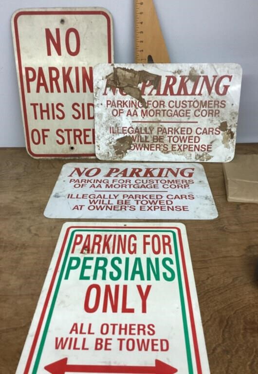 4 No Parking signs