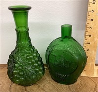 Green glass bottle and vase