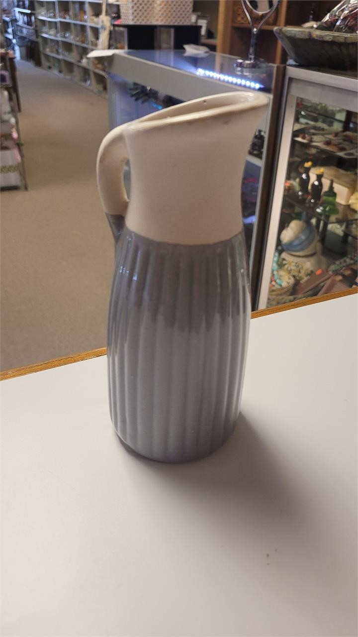 7" ceramic pitcher/vase. Glazed bottom