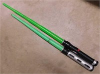 2 Star Wars light sabers, battery operated