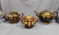 3 brown handpainted teapots