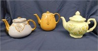 3 teapots & 2 trimmed in gold