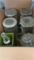 BOX WITH COKE BOTTLES AND LARGE GLASS VASES