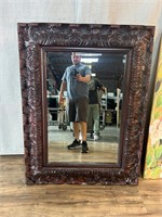 Carved Dark Wood Framed Mirror