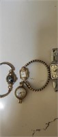 WOMENS WATCHES  3 GOLD ONE SILVER