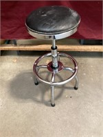 Adjustable chrome swivel work stool