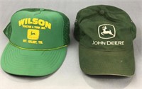 2 used John Deere baseball caps in good condition