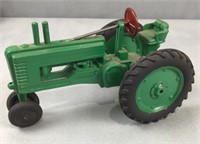 John Deere tractor made of plastic metal and