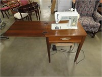 Singer Sewing Machine in Cabinet