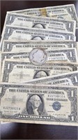 8 Silver Certificates & 1 worn out silver Dollar
