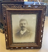 Portrait of Man in Carved Frame