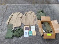 Assorted Vintage Military Uniforms with Army Books
