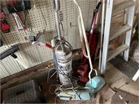Old vaccums and other cleaners, ladder