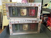 2 yankee candle gift sets 3 candles in each set