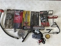 Assorted tools. Compression tester kit.
