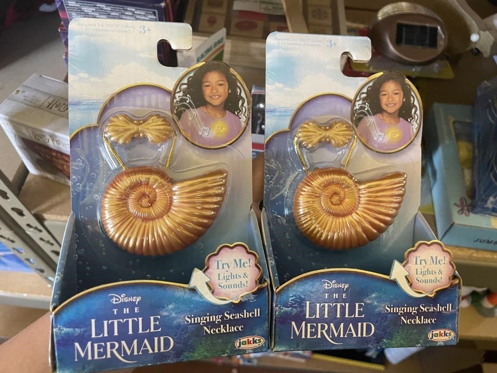 2 little mermaid singing and lighted sea shell